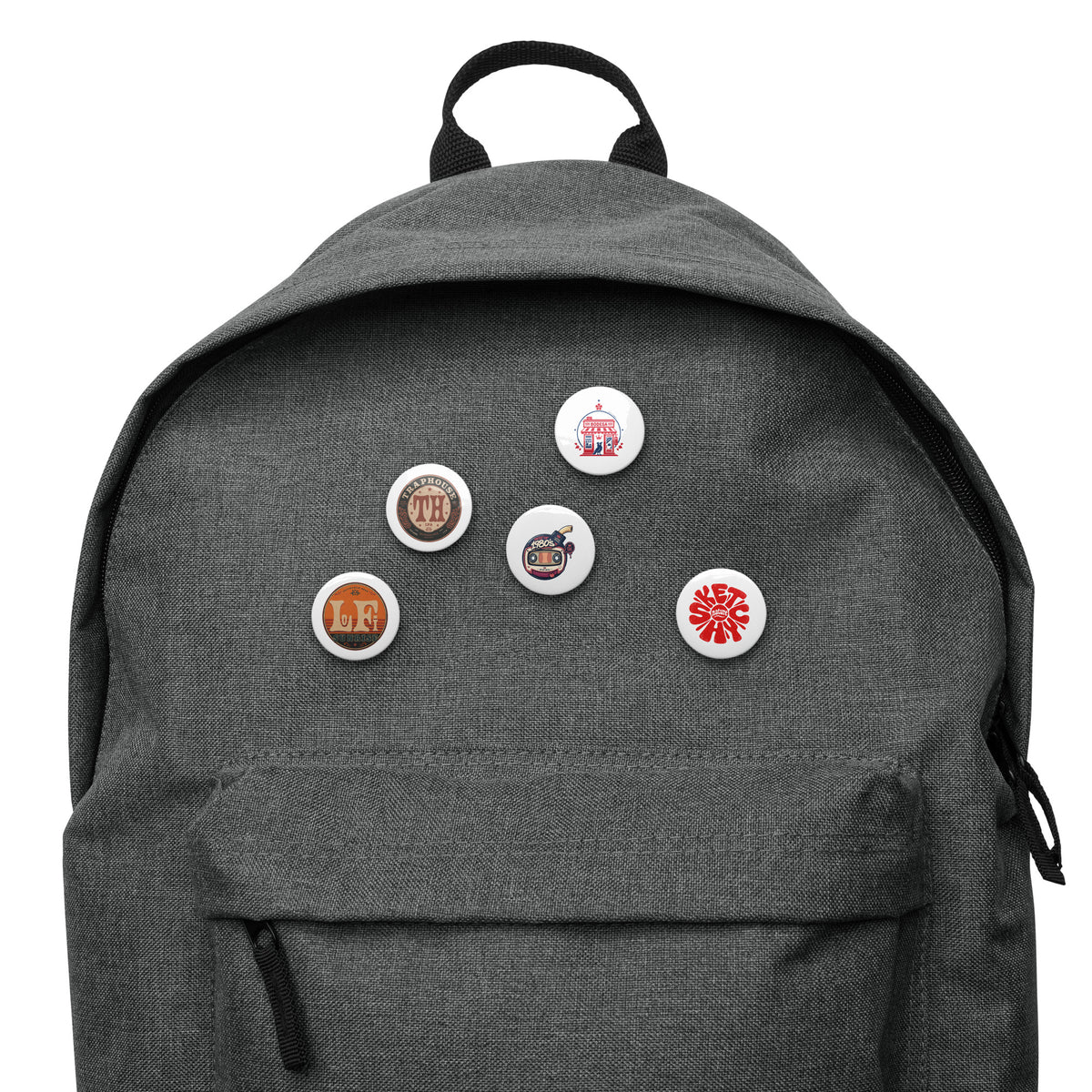 Sketchy Pin Set (5-Pack) by Sketchy Nature, five 1.25-inch music and art pin buttons displayed on a backpack