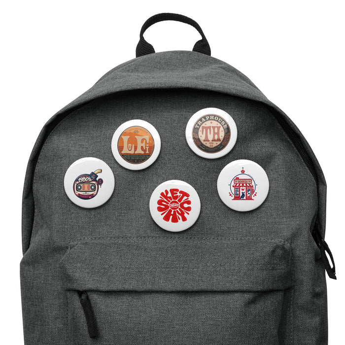 Sketchy Pin Set (5-Pack) by Sketchy Nature, five 2.25-inch music and art pin buttons displayed on a backpack